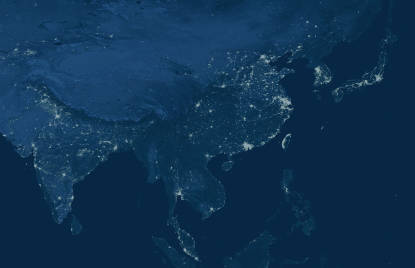 A flat representation of Earth, highlighting illuminated cities with high population density